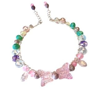 Hand wired bracelet with Czech Glass Butterflies and multiple crystal beads.